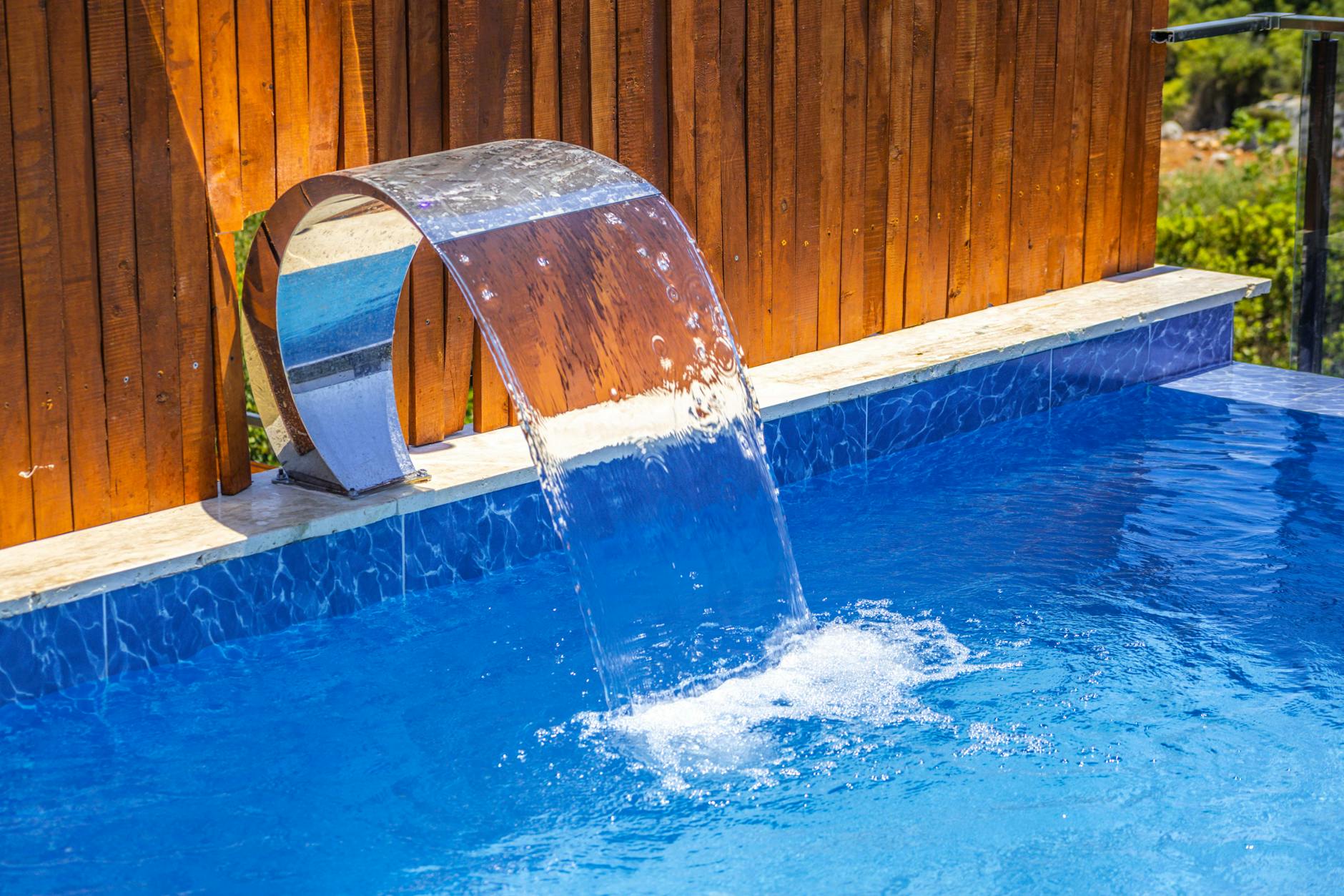 New fibreglass pool installation with paving and frameless glass fencing in Adelaide